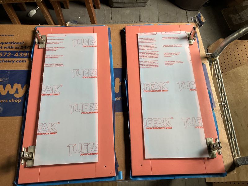plexiglass panels so you can see books inside